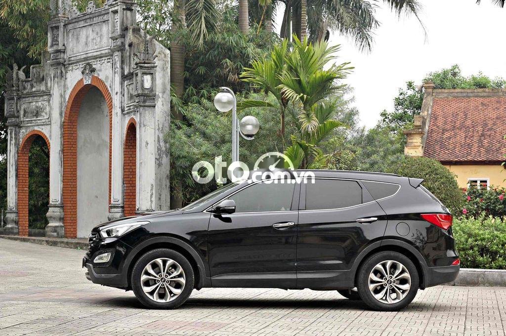 Hyundai Santa Fe 2016 - Bán ô tô Hyundai Santa Fe 2.4L máy xăng sản xuất 2016, màu đen