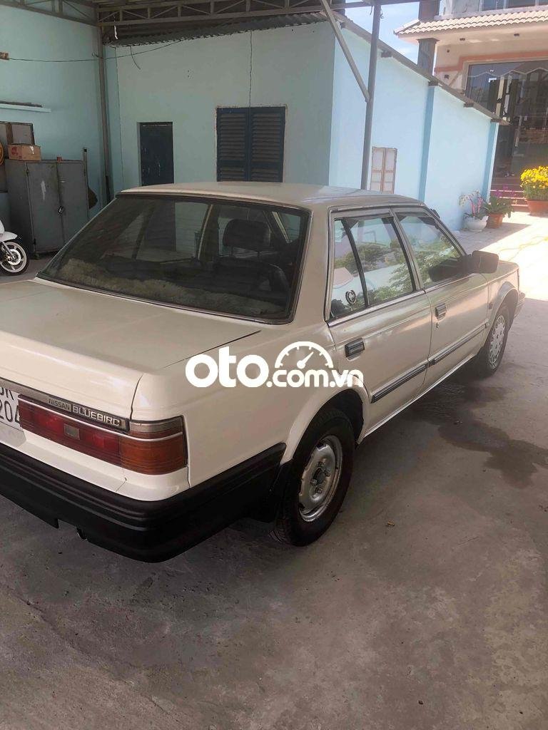 Nissan Bluebird 1986 - Bán Nissan Bluebird sản xuất năm 1986, màu trắng