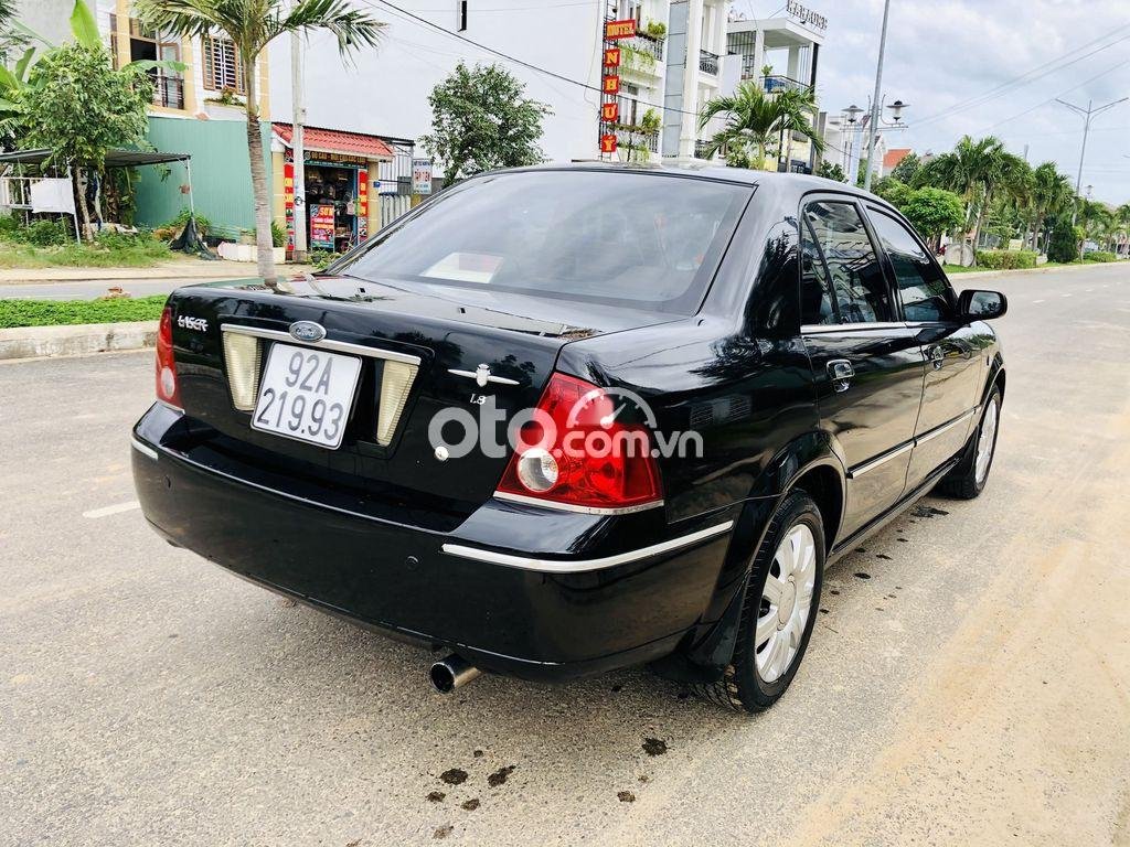 Ford Laser 2004 - Bán ô tô Ford Laser sản xuất 2004, màu đen, 157 triệu