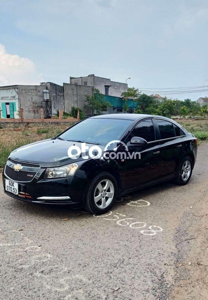 Chevrolet Cruze 2011 - Bán ô tô Chevrolet Cruze LS sản xuất 2011, màu đen số sàn, 245tr