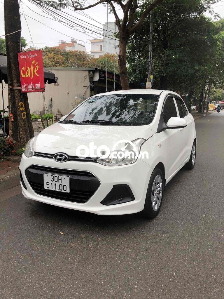 Hyundai Grand i10 2016 - Bán ô tô Hyundai Grand i10 MT năm 2016, màu trắng, xe nhập chính chủ