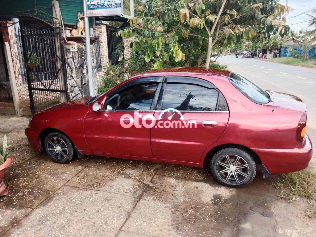 Daewoo Lanos 2003 - Cần bán Daewoo Lanos sản xuất 2003, màu đỏ