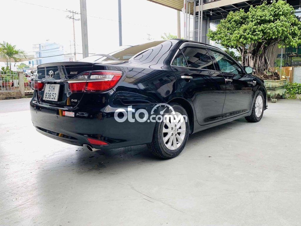 Toyota Camry 2015 - Bán xe Toyota Camry 2.0E sản xuất năm 2015, màu đen, giá 670tr