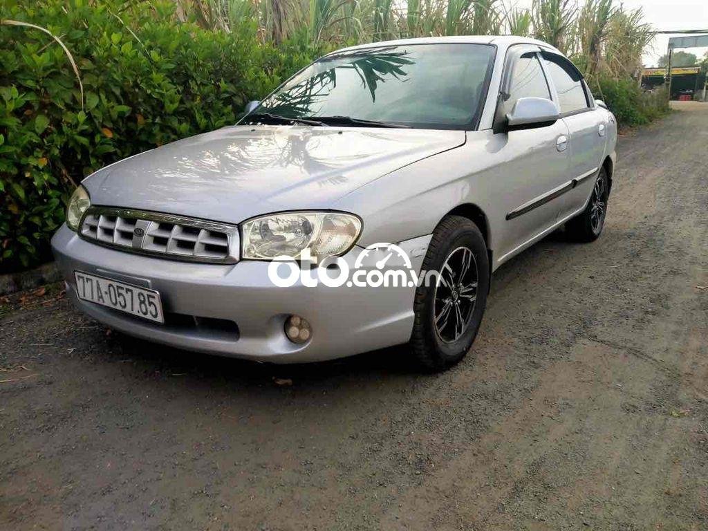 Kia Spectra 2004 - Bán xe Kia Spectra MT năm sản xuất 2004, màu bạc