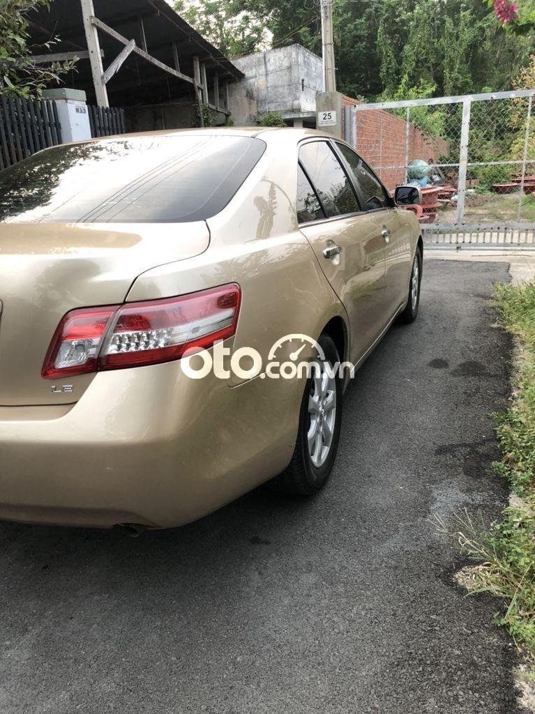 Toyota Camry 2008 - Bán xe Toyota Camry LE sản xuất năm 2008, màu vàng, xe nhập