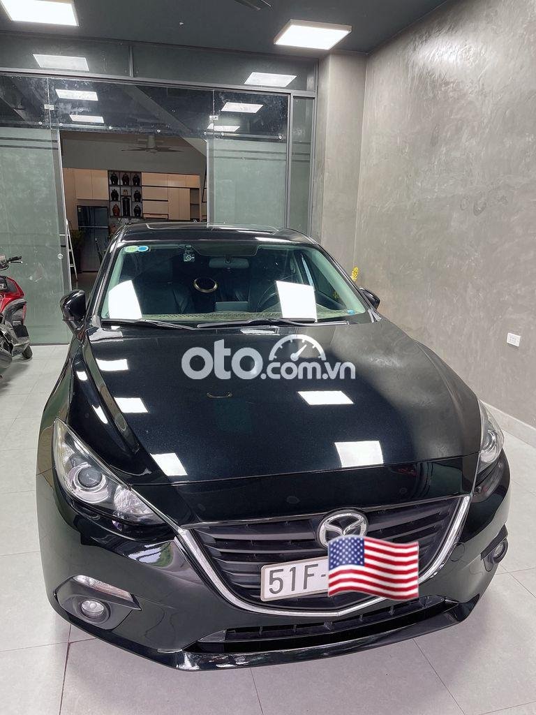 Mazda 3 2016 - Bán Mazda 3 1.5 Hatchback sản xuất năm 2016, màu đen còn mới