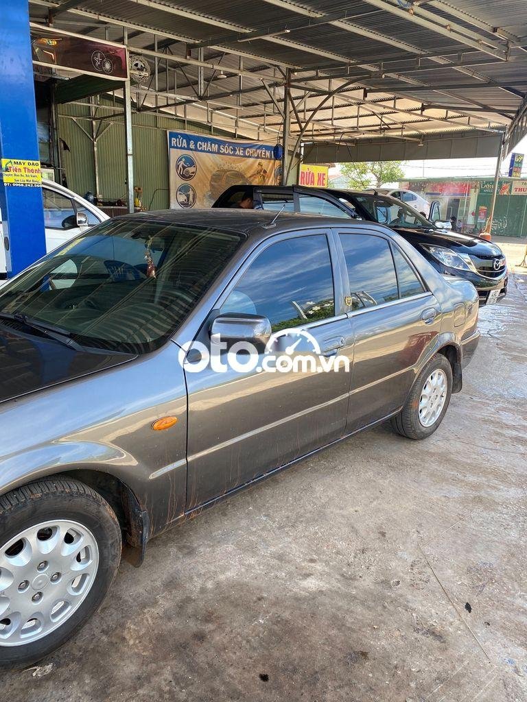 Ford Laser 2001 - Cần bán xe Ford Laser MT sản xuất 2001, màu nâu, nhập khẩu