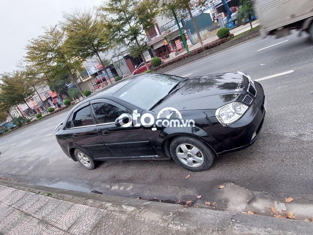 Daewoo Lacetti 2004 - Bán ô tô Daewoo Lacetti năm 2004, màu đen, xe nhập