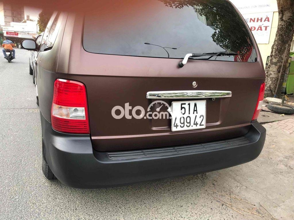 Kia Carnival 2009 - Xe Kia Carnival năm sản xuất 2009, màu nâu, nhập khẩu 