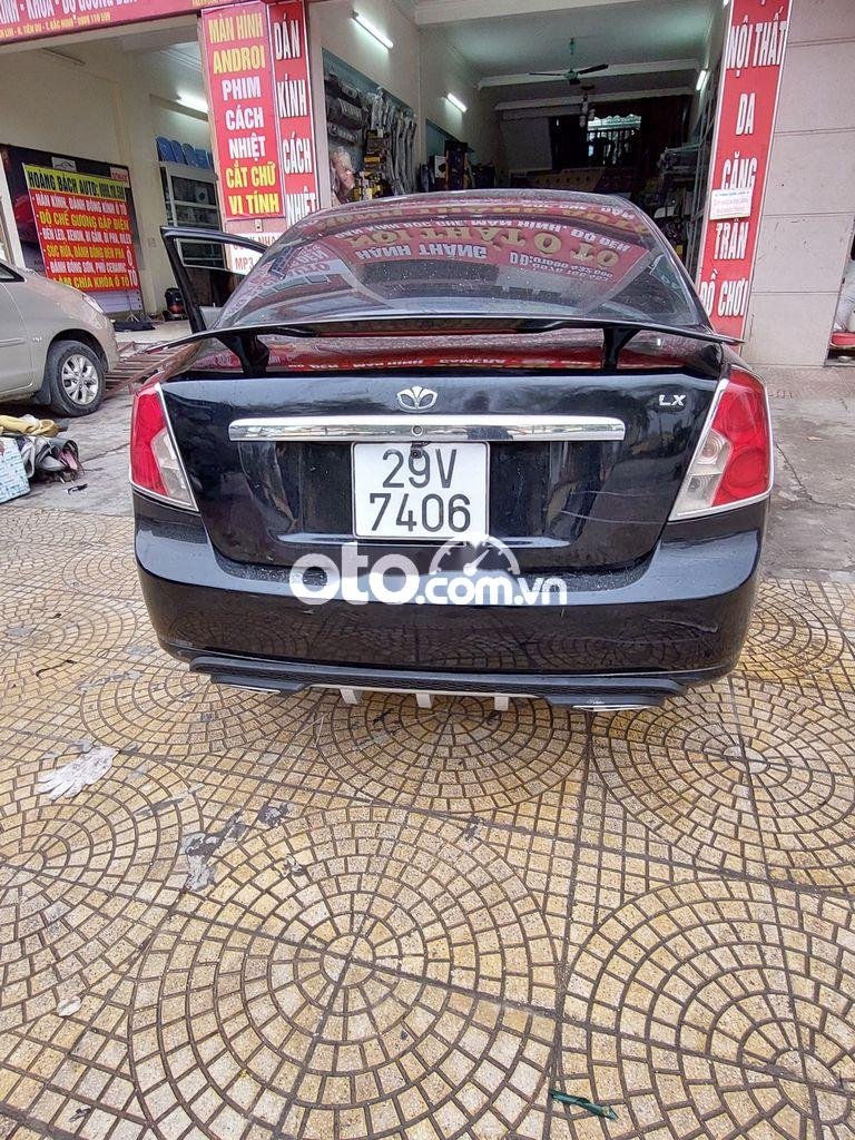 Daewoo Lacetti 2004 - Bán ô tô Daewoo Lacetti năm 2004, màu đen, xe nhập