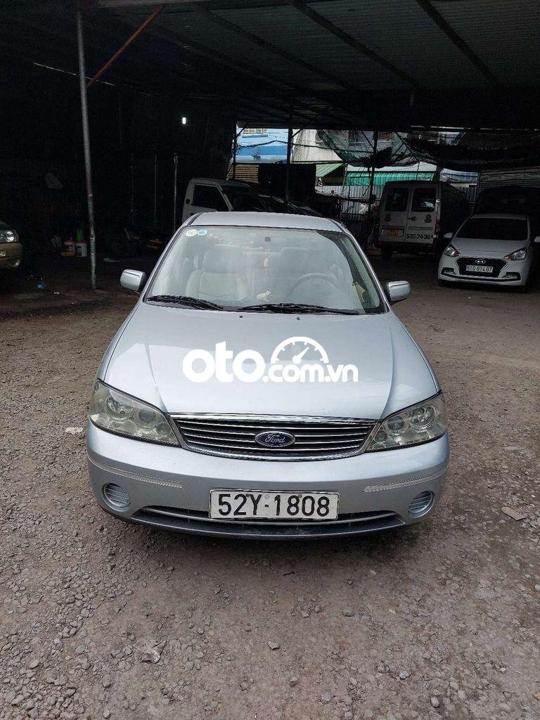 Ford Laser 2004 - Bán ô tô Ford Laser LXI năm 2004, màu bạc số sàn