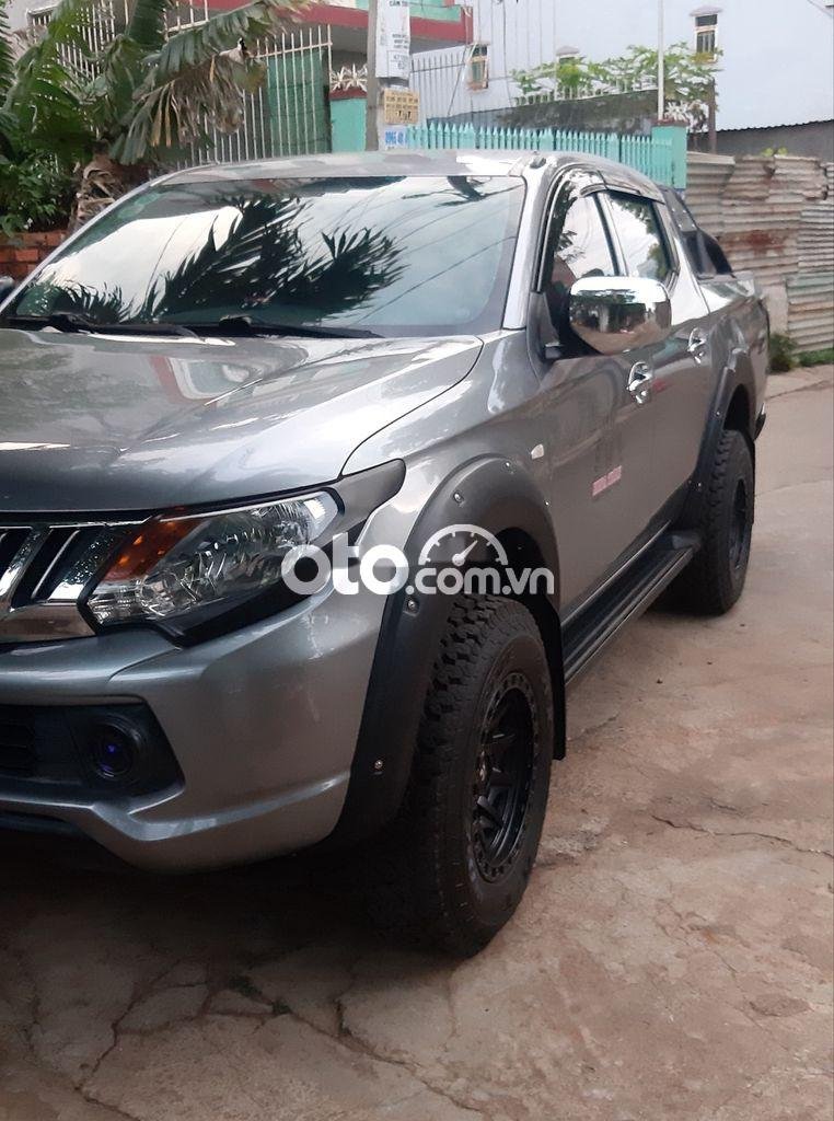 Mitsubishi Triton 2015 - Bán Mitsubishi Triton sản xuất 2015, màu xám, xe nhập số sàn, 415 triệu