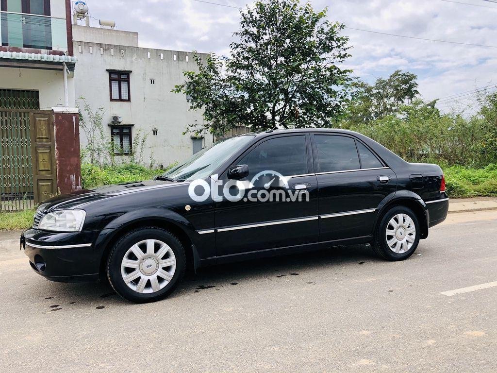 Ford Laser 2004 - Bán ô tô Ford Laser sản xuất 2004, màu đen, 157 triệu