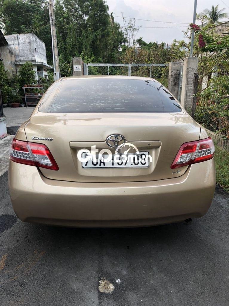 Toyota Camry 2008 - Bán xe Toyota Camry LE sản xuất năm 2008, màu vàng, xe nhập