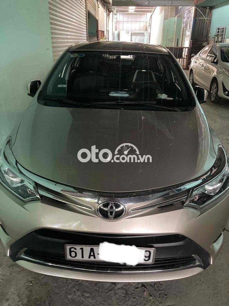 Toyota Vios 2015 - Bán ô tô Toyota Vios 1.5G AT sản xuất năm 2015, màu xám xe gia đình, giá 410tr