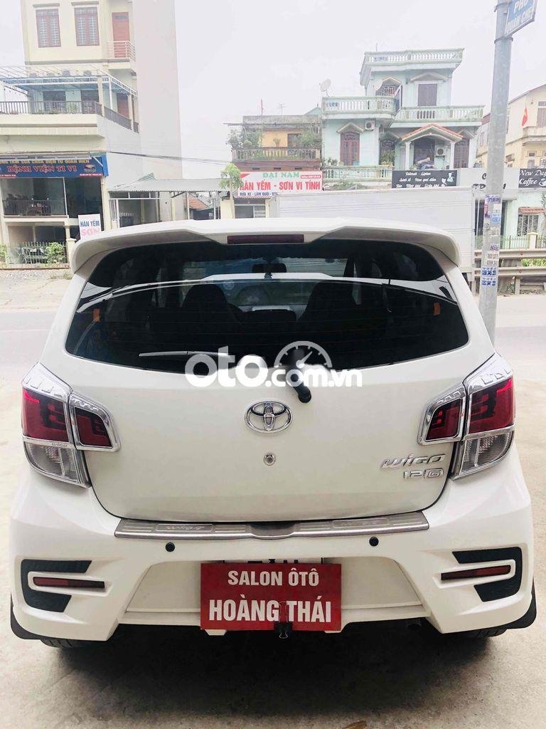 Toyota Wigo 2019 - Bán Toyota Wigo 1.2G AT sản xuất 2019, màu trắng, 348tr