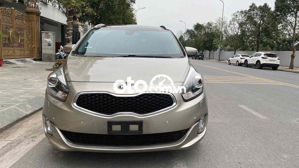 Kia Rondo 2015 - Bán Kia Rondo sản xuất năm 2015, màu vàng, giá 495tr