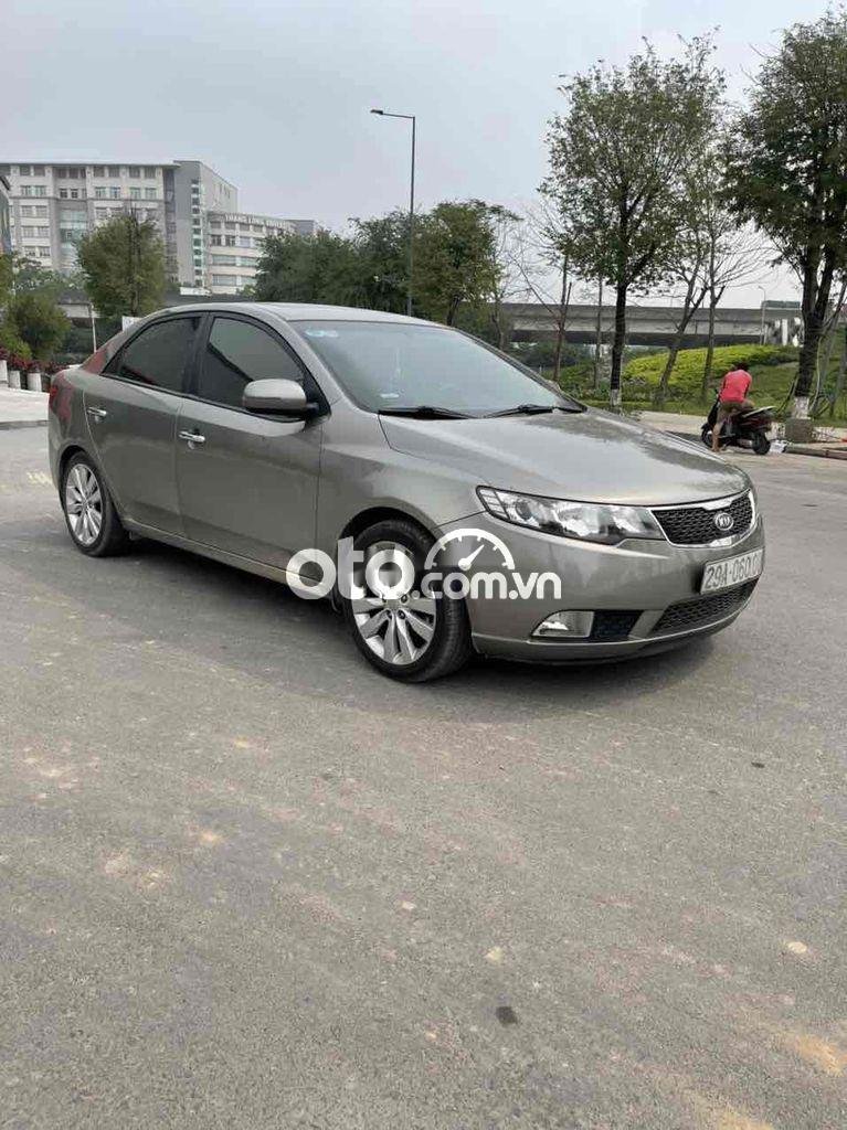 Kia Cerato 2010 - Bán Kia Cerato 1.6AT Deluxe sản xuất 2010, màu xám