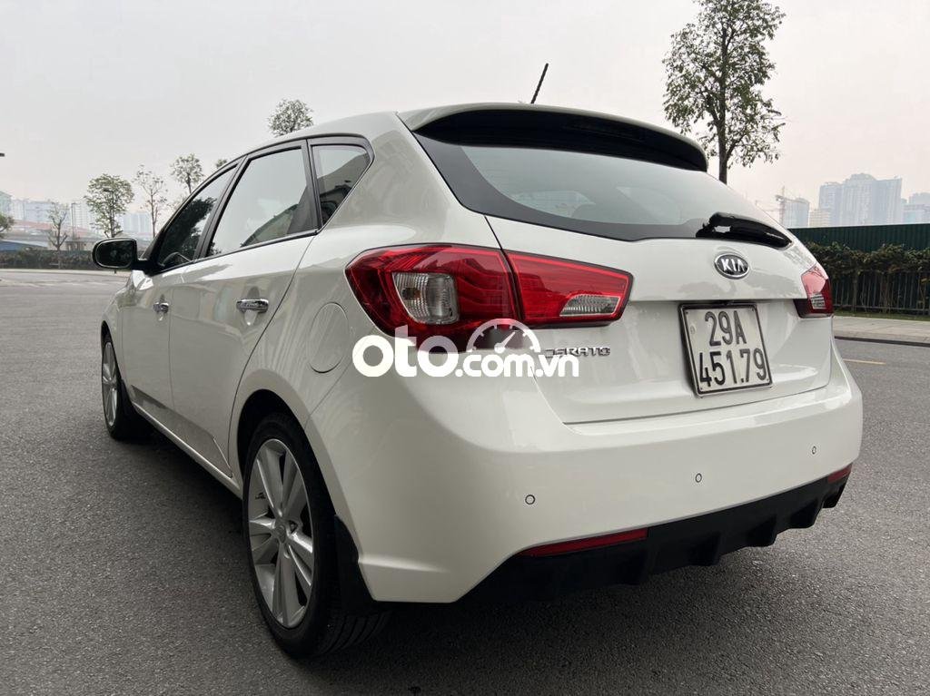 Kia Cerato 2011 - Cần bán Kia Cerato 1.6AT sản xuất năm 2011, màu trắng