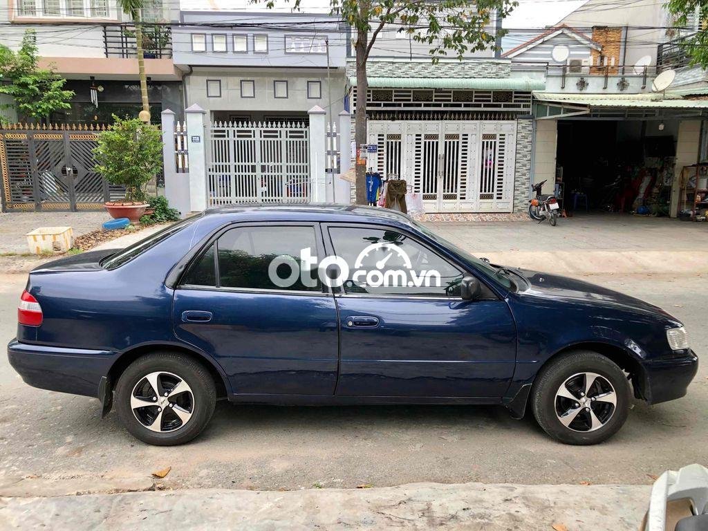 Toyota Corolla 2001 - Cần bán Toyota Corolla năm 2001, màu xanh lam như mới