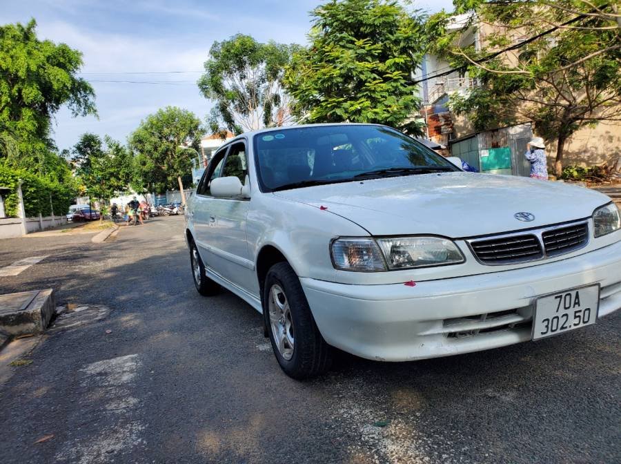 Toyota Corolla 2000 - Cần bán Toyota Corolla 1.6 GLi sản xuất năm 2000, màu trắng 