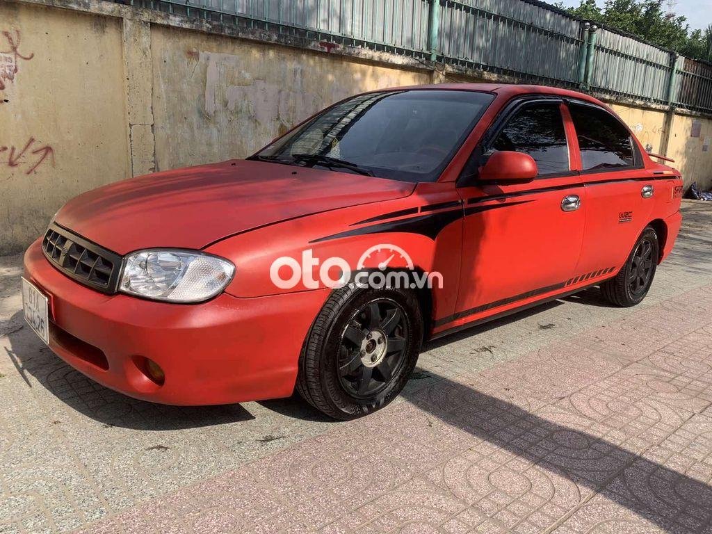 Kia Spectra 2004 - Cần bán Kia Spectra năm sản xuất 2004, màu đỏ, nhập khẩu 