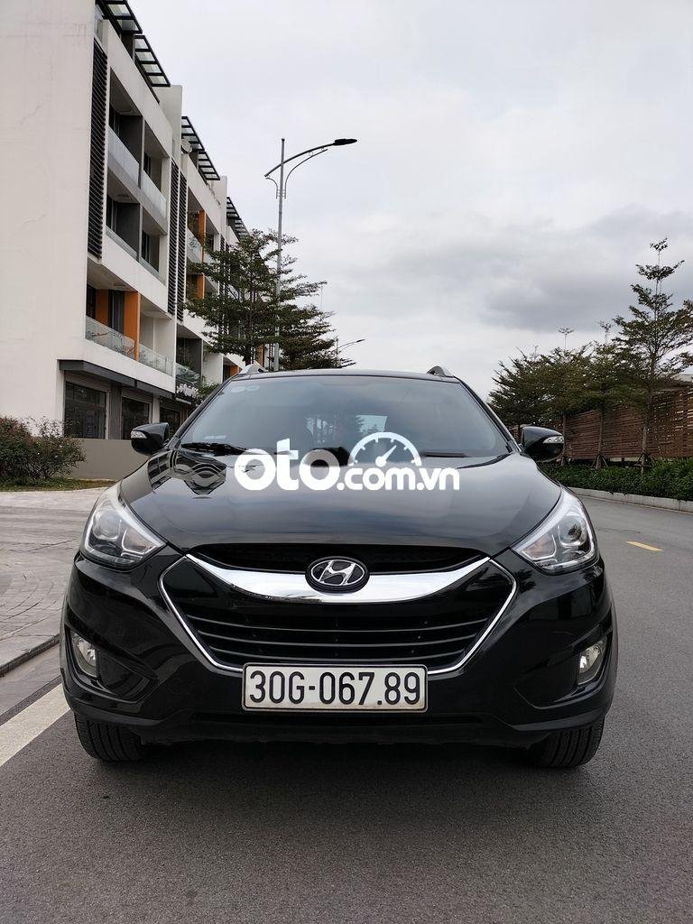 Hyundai Tucson 2014 - Cần bán lại xe Hyundai Tucson 2.0AT sản xuất năm 2014, màu đen, nhập khẩu Hàn Quốc