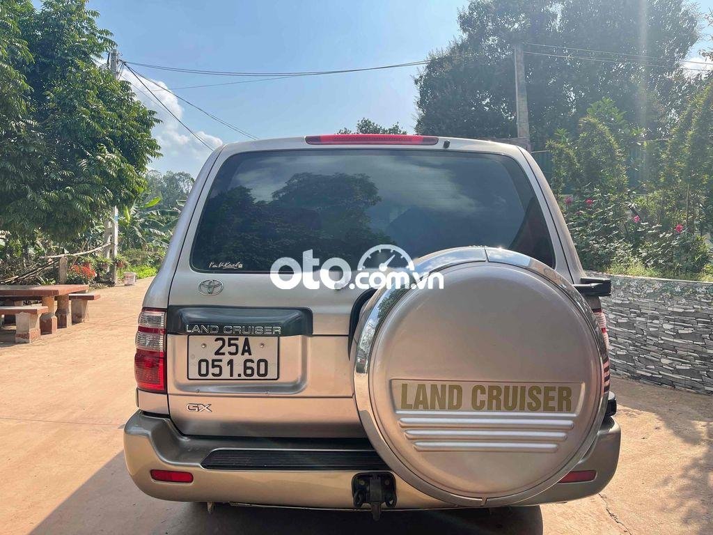 Toyota Land Cruiser 2004 - Cần bán lại xe Toyota Land Cruiser sản xuất năm 2004, màu ghi vàng