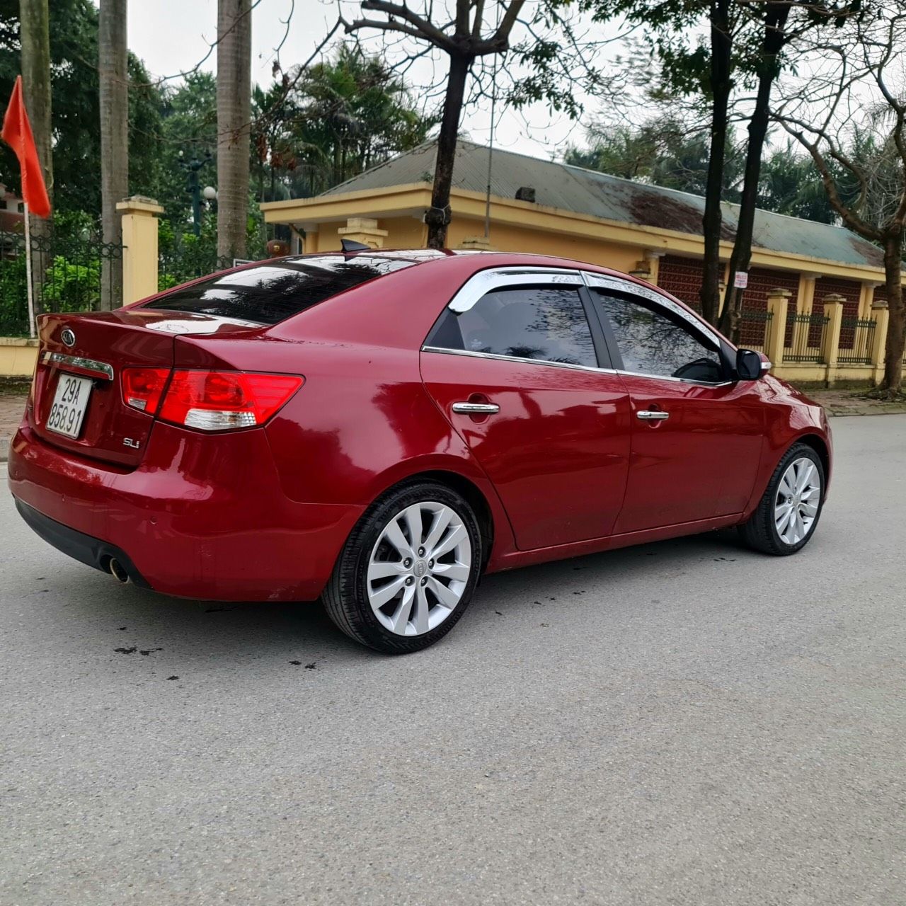 Kia Forte 2010 - Cần bán Kia Forte SLI 1.6AT sản xuất 2010, màu đỏ, xe nhập, 289tr