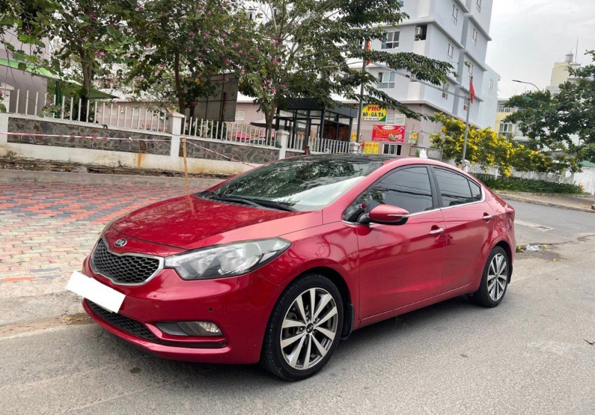 Kia K3 2015 - Bán Kia K3 1.6AT sản xuất năm 2015, màu đỏ