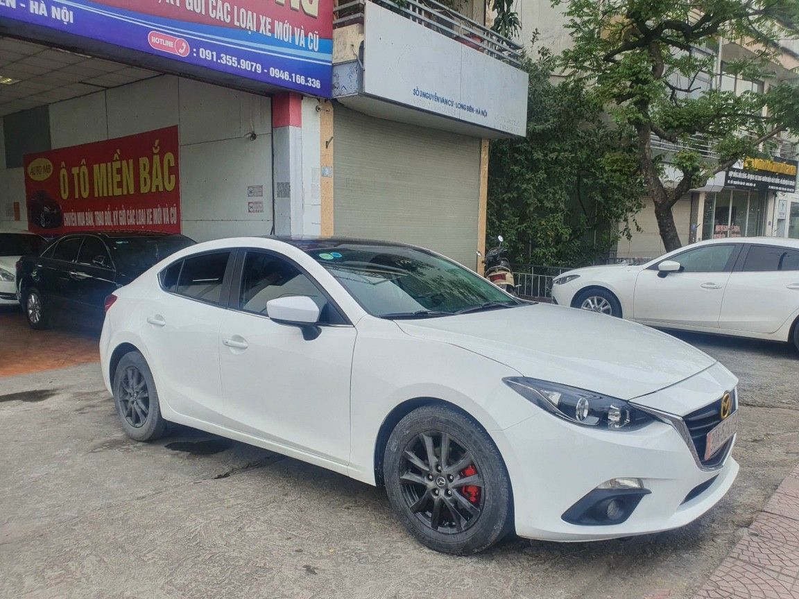 Mazda 3 2015 - Cần bán xe Mazda 3 1.5L sản xuất 2015, màu trắng