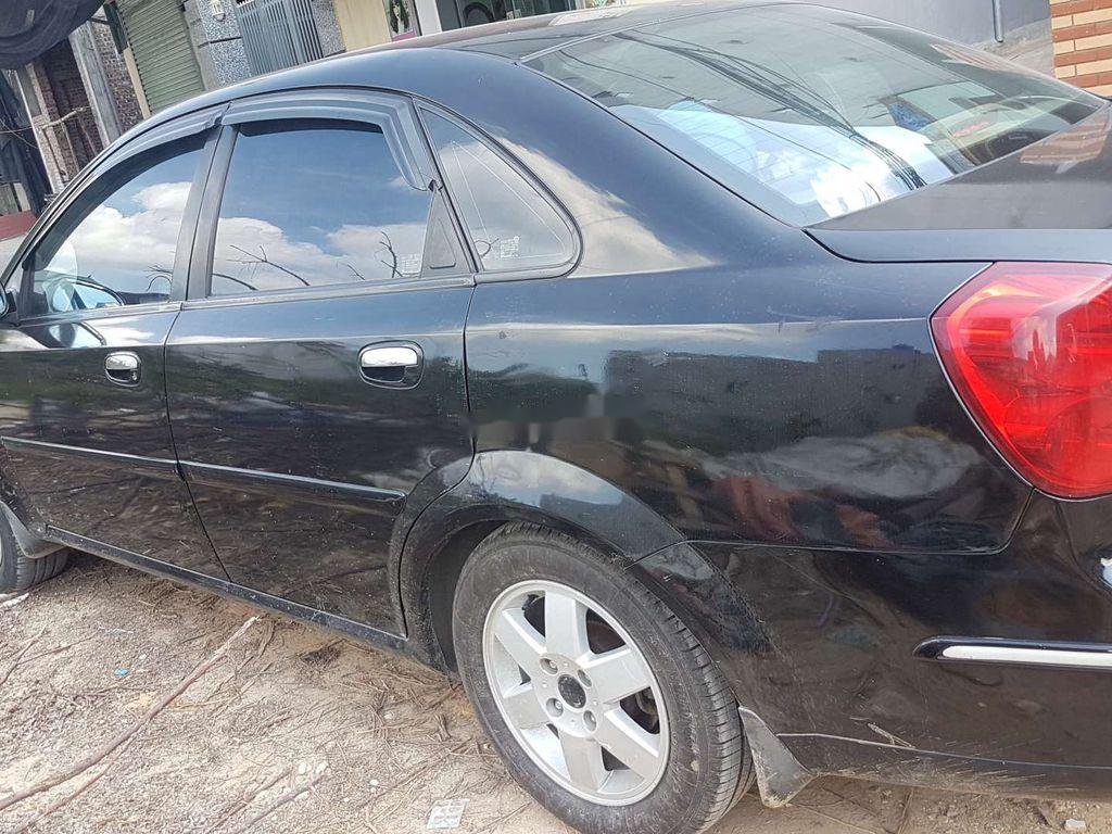 Daewoo Lacetti 2004 - Cần bán lại xe Daewoo Lacetti đời 2004, màu đen, giá chỉ 95 triệu