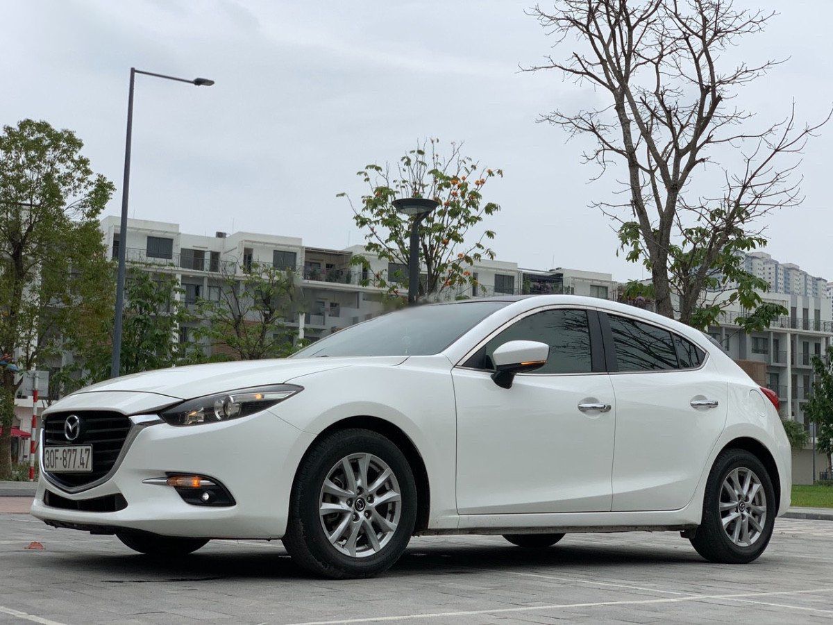 Mazda 3 2018 - Bán ô tô Mazda 3 sản xuất 2018, màu trắng, 579 triệu