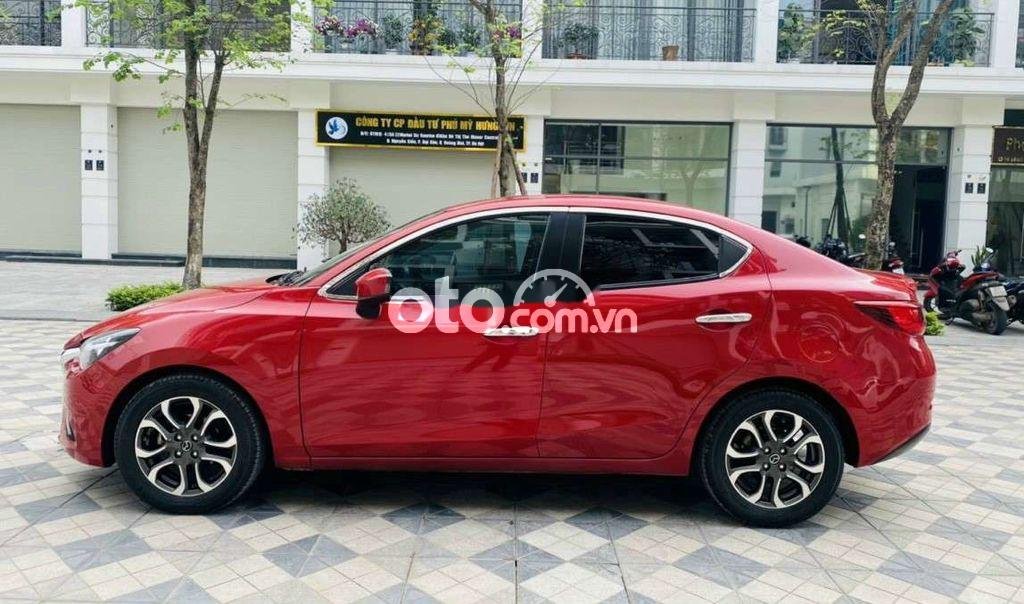 Mazda 2 2016 - Cần bán lại xe Mazda 2 AT sản xuất năm 2016, màu đỏ