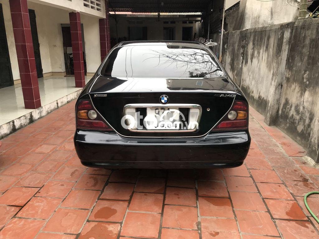 Daewoo Magnus 2003 - Xe Daewoo Magnus năm 2003, màu đen, nhập khẩu Hàn Quốc