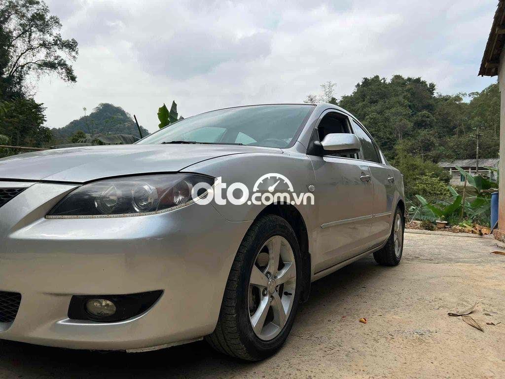 Mazda 3 2004 - Bán Mazda 3 1.5L Sedan sản xuất năm 2004, màu bạc, giá chỉ 209 triệu