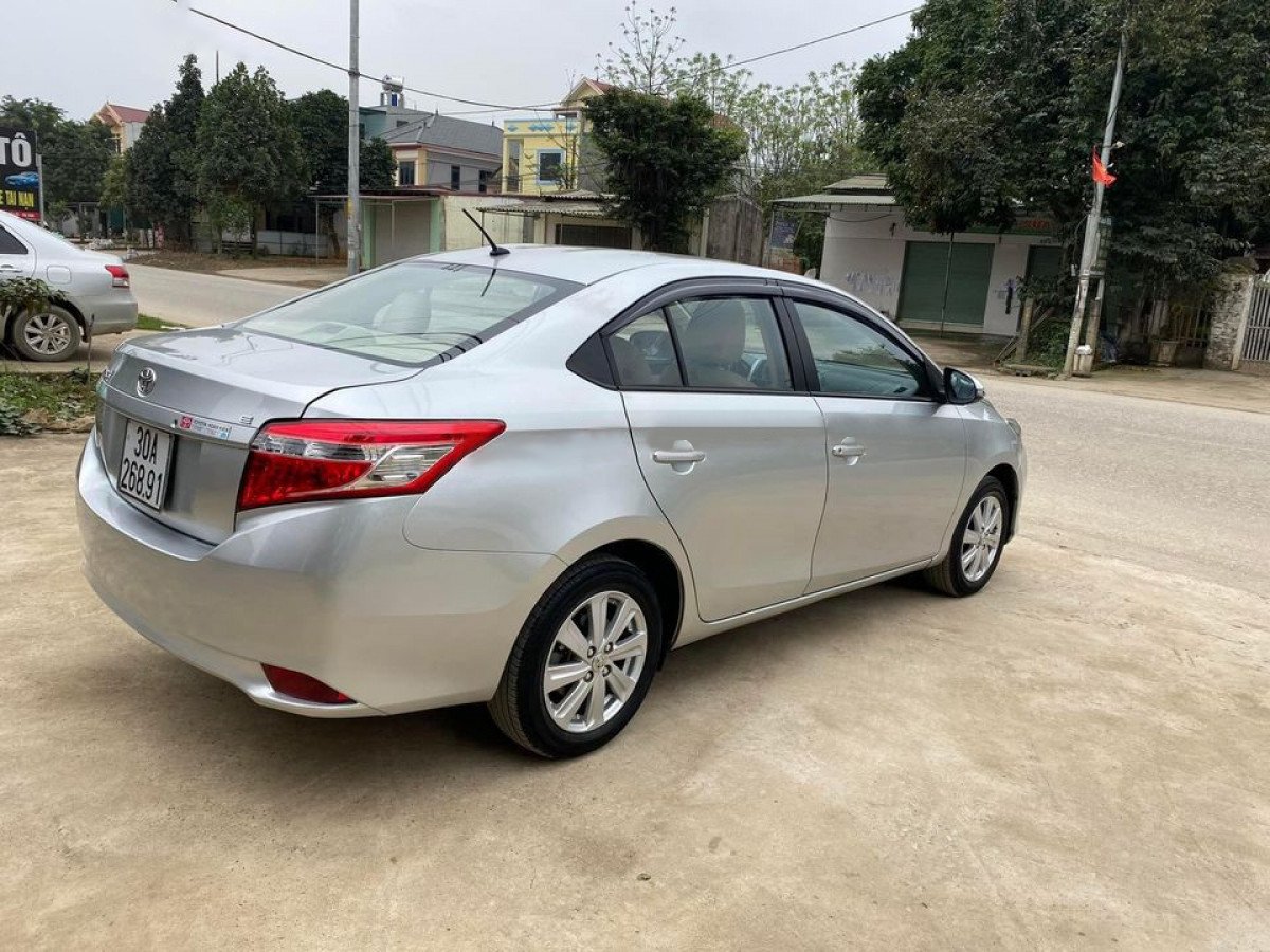 Toyota Vios 2014 - Bán xe Toyota Vios E sản xuất 2014, màu bạc số sàn, 332 triệu