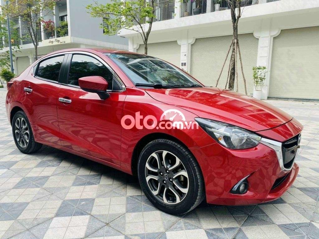 Mazda 2 2016 - Cần bán lại xe Mazda 2 AT sản xuất năm 2016, màu đỏ