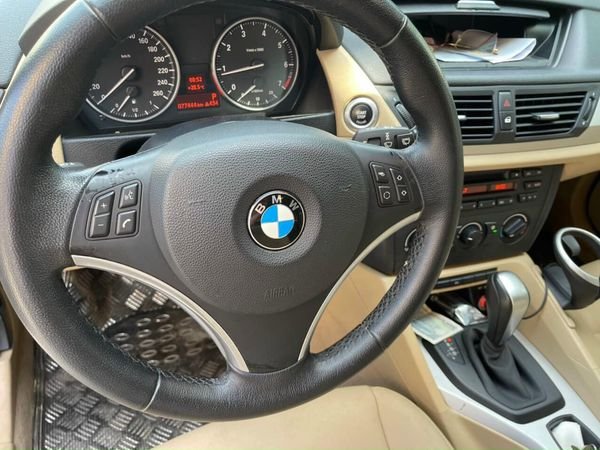 BMW X1 2010 - Cần bán gấp BMW X1 năm sản xuất 2010, màu trắng, xe nhập Đức