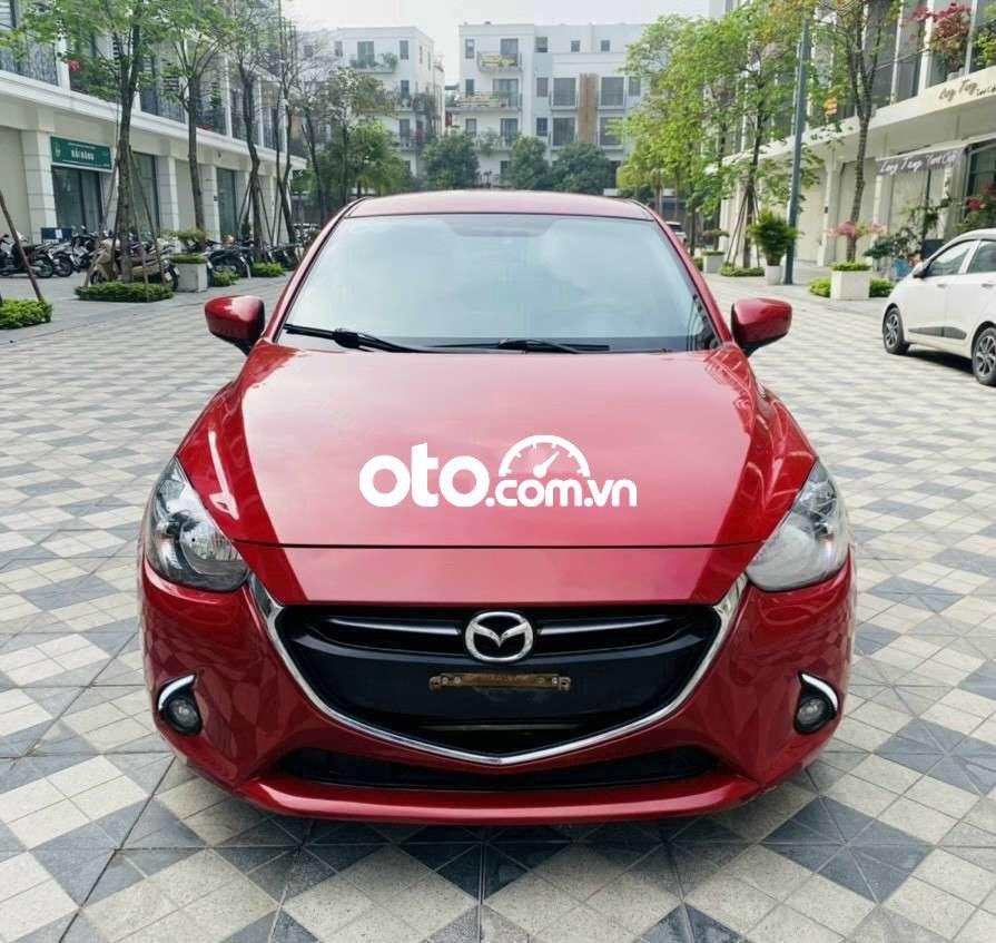 Mazda 2 2016 - Cần bán lại xe Mazda 2 AT sản xuất năm 2016, màu đỏ