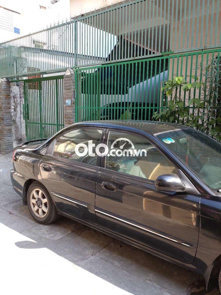 Kia Spectra 2005 - Cần bán Kia Spectra năm 2005 xe gia đình