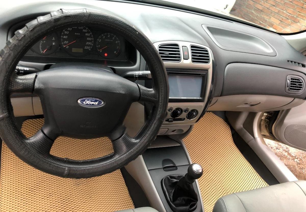 Ford Laser 2002 - Xe màu vàng