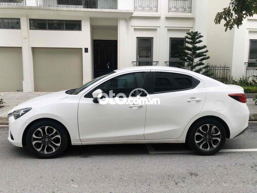 Mazda 2 2016 - Cần bán lại xe Mazda 2 1.5AT sản xuất năm 2016, màu trắng chính chủ