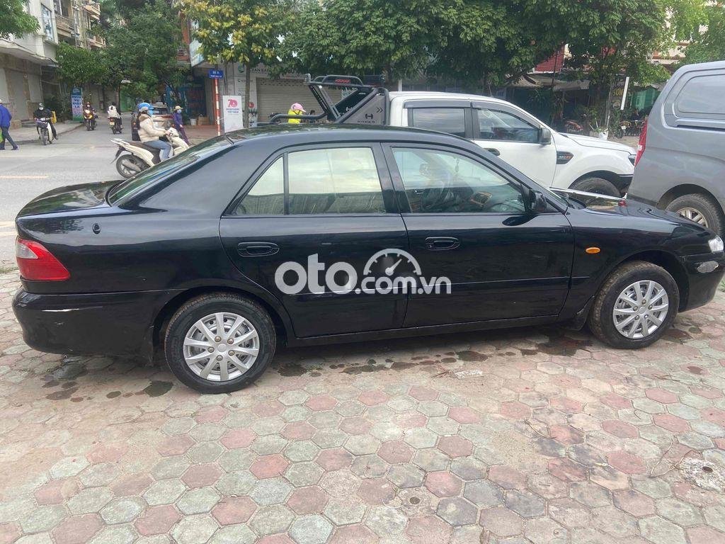 Mazda 626 2001 - Màu đen