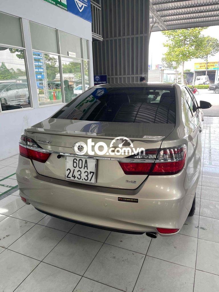 Toyota Camry 2015 - Màu vàng cát