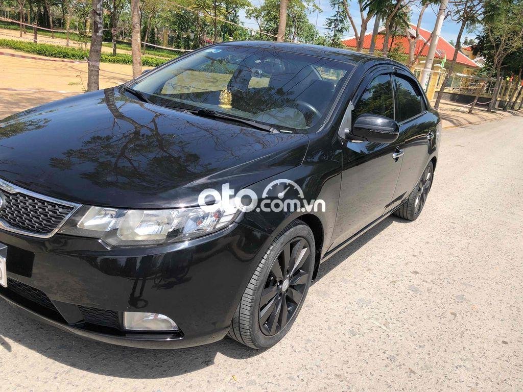 Kia Forte 2012 - Màu đen số tự động giá hữu nghị