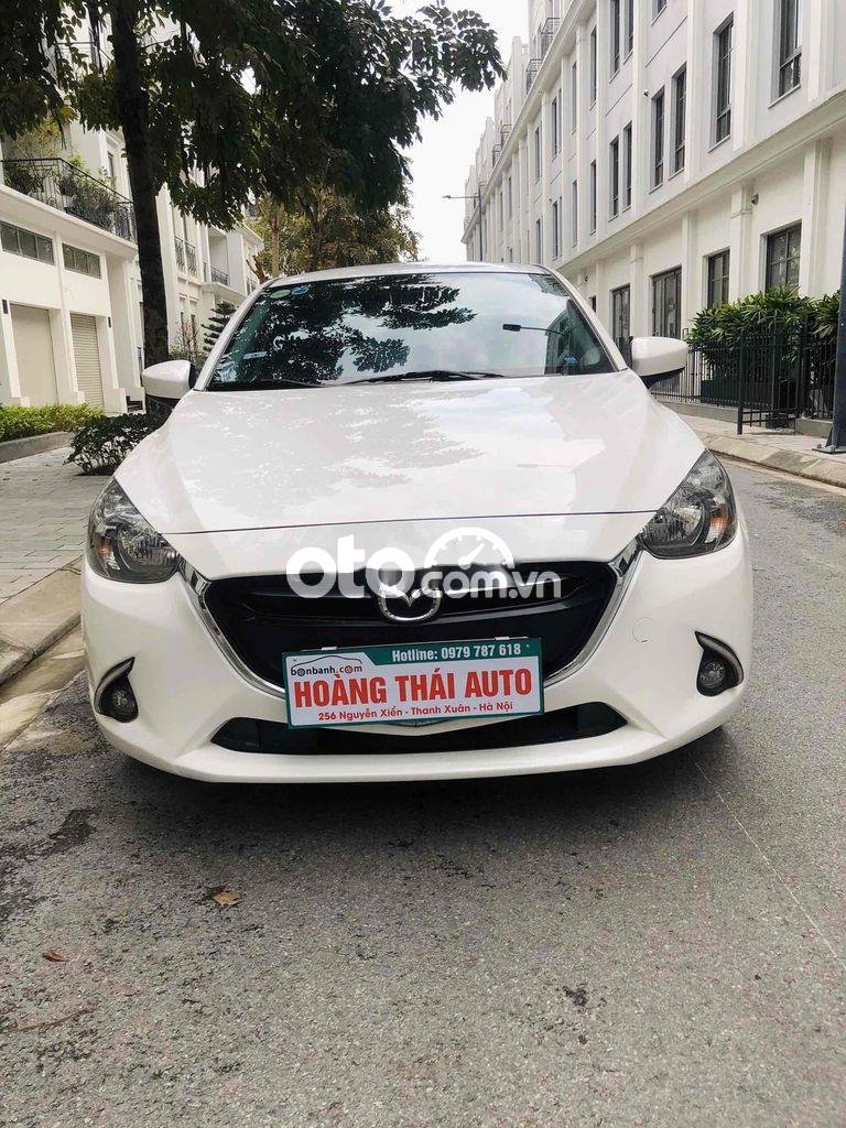 Mazda 2 2016 - Cần bán lại xe Mazda 2 1.5AT sản xuất năm 2016, màu trắng chính chủ