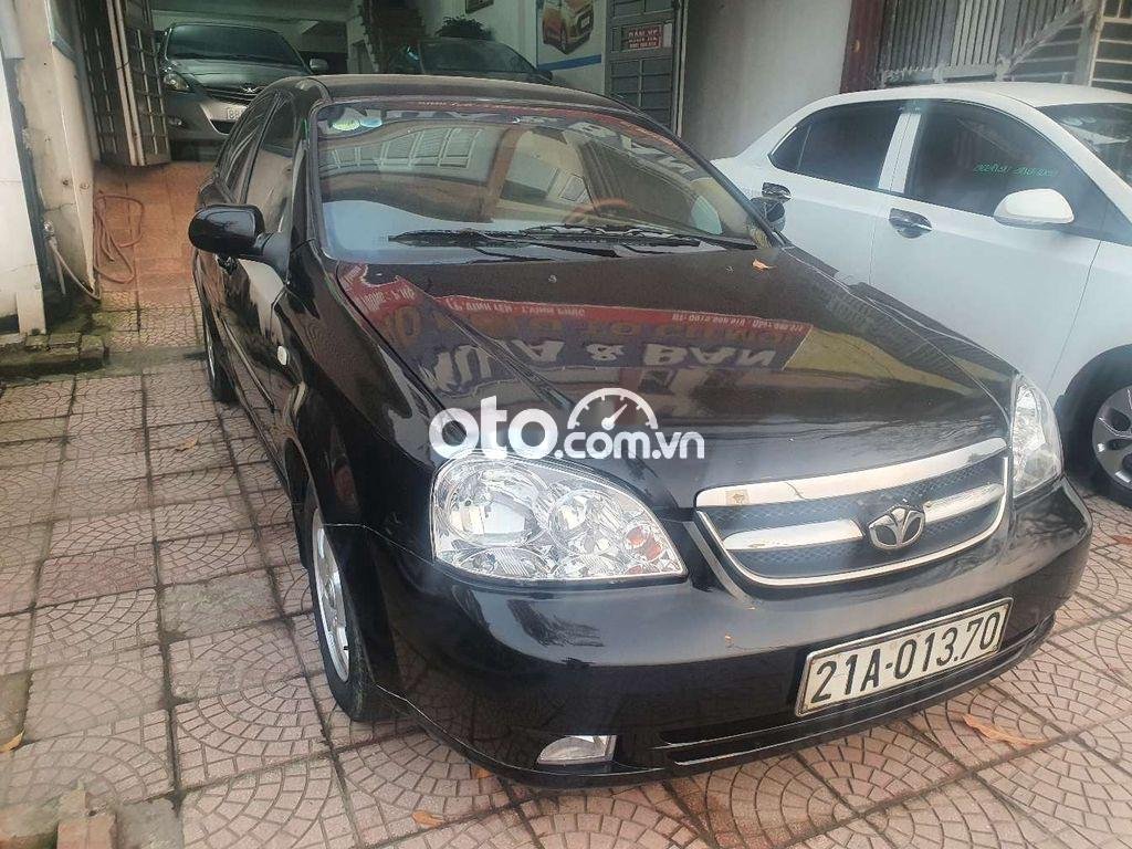 Daewoo Lacetti 2009 - Bán xe Daewoo Lacetti năm sản xuất 2009, màu đen xe gia đình