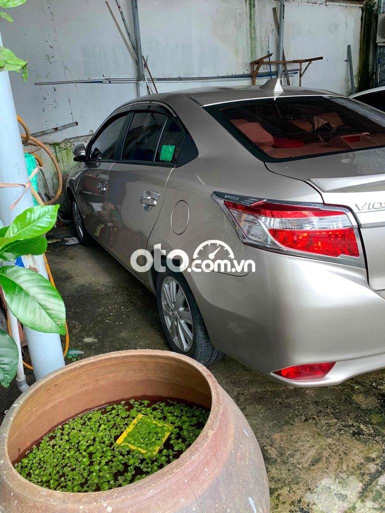 Toyota Vios 2016 - Xe màu vàng cát