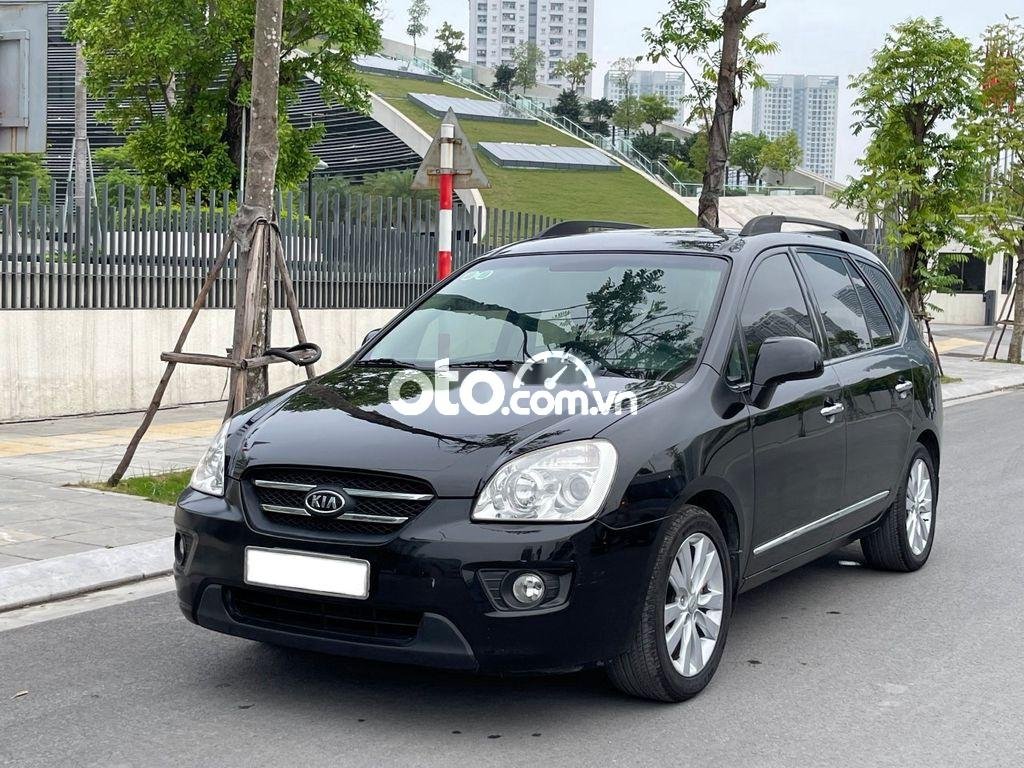 Kia Carens 2010 - Màu đen giá cạnh tranh